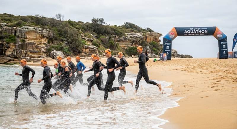 Runners competing in a aquathon event